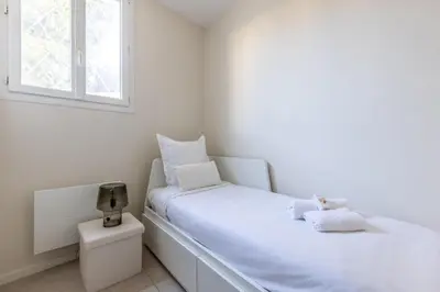Un ou plusieurs lits dans un hébergement de l'établissement Modern 2 Chambres-TERRASSE-POINTE CROISTTE-PALM BEACH A2B267