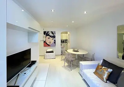 Télévision ou salle de divertissement dans l'établissement Viva Riviera Cocoon Apartment Cannes Centre