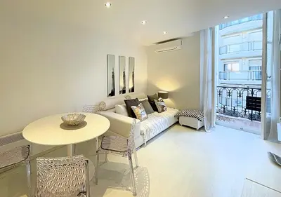 Un ou plusieurs lits dans un hébergement de l'établissement Viva Riviera Cocoon Apartment Cannes Centre