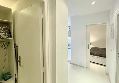 Un ou plusieurs lits dans un hébergement de l'établissement Viva Riviera Cocoon Apartment Cannes Centre