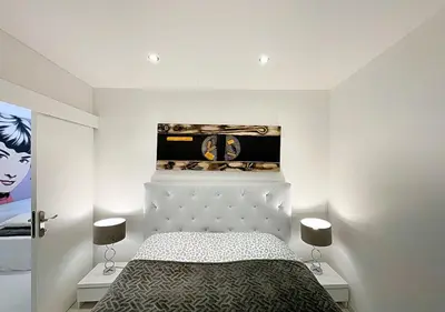 Un ou plusieurs lits dans un hébergement de l'établissement Viva Riviera Cocoon Apartment Cannes Centre