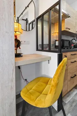 Cuisine ou kitchenette dans l'établissement Le Marina - Cosy - WIFI - Clim - Port