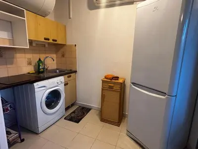 Cuisine ou kitchenette dans l'établissement Cosy studio plages Antibes