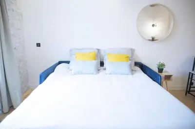 Un ou plusieurs lits dans un hébergement de l'établissement New - Appartement ou Studio Vieil Antibes