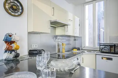 Cuisine ou kitchenette dans l'établissement Le Mimosa