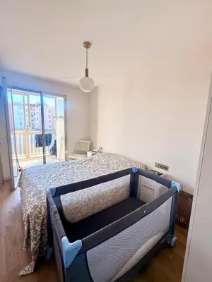 Un ou plusieurs lits dans un hébergement de l'établissement Elegance et Serenity Luxury apartment 50 m from the beach
