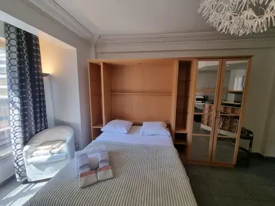 Un ou plusieurs lits dans un hébergement de l'établissement Charming Studio near Croisette