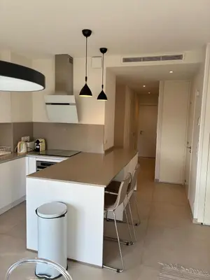 Cuisine ou kitchenette dans l'établissement Armenonvillecannes