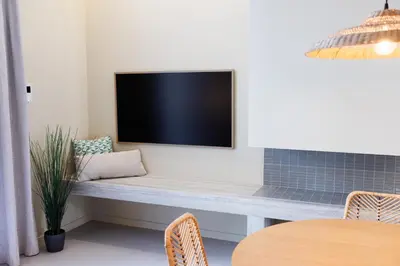 Coin salon dans l'établissement Suite Cigale Verte avec terrasse et patio à Antibes