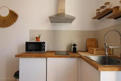 Cuisine ou kitchenette dans l'établissement Pearl Studio by Halldis
