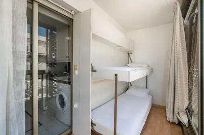 Un ou plusieurs lits dans un hébergement de l'établissement Spacieux 2 pièces en plein centre-ville de Cannes