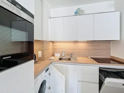 Cuisine ou kitchenette dans l'établissement 47m2 - climatisation, carré d'or