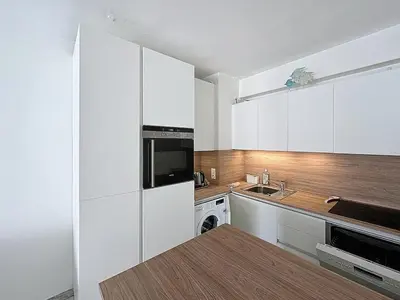 Cuisine ou kitchenette dans l'établissement 47m2 - climatisation, carré d'or