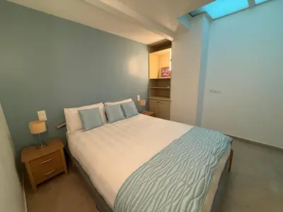 Un ou plusieurs lits dans un hébergement de l'établissement Port Rivage - House with panoramic roof terrace
