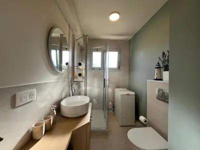 Salle de bains dans l'établissement Riva
