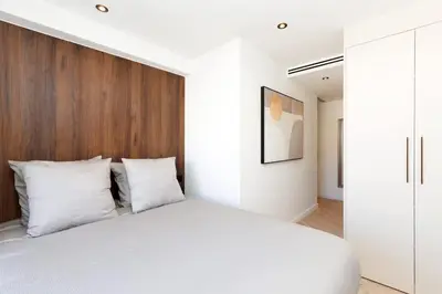 Un ou plusieurs lits dans un hébergement de l'établissement Quartier Marriott - Superbe 3 pieces
