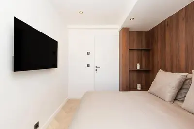 Un ou plusieurs lits dans un hébergement de l'établissement Quartier Marriott - Superbe 3 pieces