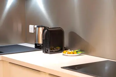 Cuisine ou kitchenette dans l'établissement Celestre Croisette - Appartement de Luxe Croisette avec Terrasse et Vue Mer