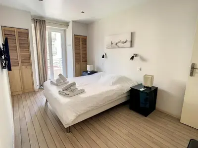 Un ou plusieurs lits dans un hébergement de l'établissement Appartements Medicis