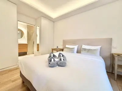 Un ou plusieurs lits dans un hébergement de l'établissement Cannes 2x2 bedrooms apartment - 24P3