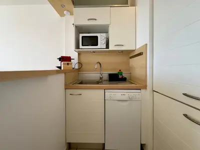 Cuisine ou kitchenette dans l'établissement Le Marco Polo SCLS - Wifi, Climatisation, Vue Mer
