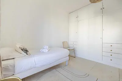 Un ou plusieurs lits dans un hébergement de l'établissement Splendid apartment a-c 2BR-4P - Sea View