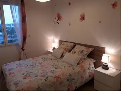 Un ou plusieurs lits dans un hébergement de l'établissement Apartment Die Gärten von Antibes by Interhome