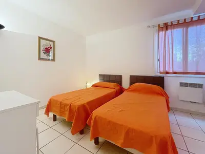 Un ou plusieurs lits dans un hébergement de l'établissement 2 bedroom Pradignac 305