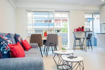 Coin salon dans l'établissement Sublime 2p - 10 min near beaches - Air conditioning - Garage