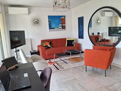 Télévision ou salle de divertissement dans l'établissement Appartement Ima