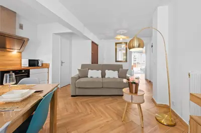 Coin salon dans l'établissement Coeur de ville - A 300m des plages - Parking - FN