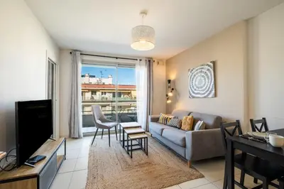 Télévision ou salle de divertissement dans l'établissement Appartement Olivier - Welkeys