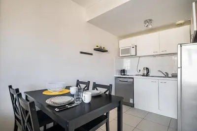 Cuisine ou kitchenette dans l'établissement Appartement Olivier - Welkeys