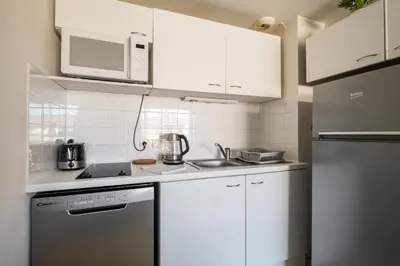 Cuisine ou kitchenette dans l'établissement Appartement Olivier - Welkeys