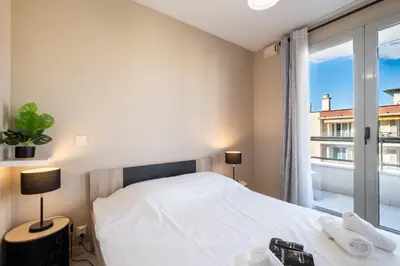 Un ou plusieurs lits dans un hébergement de l'établissement Appartement Olivier - Welkeys