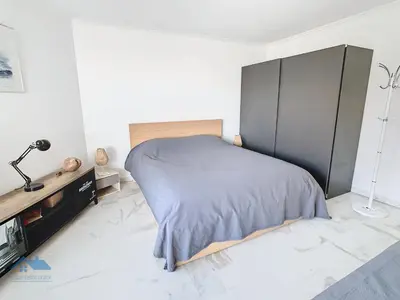 Un ou plusieurs lits dans un hébergement de l'établissement Appartements derrière Croisette