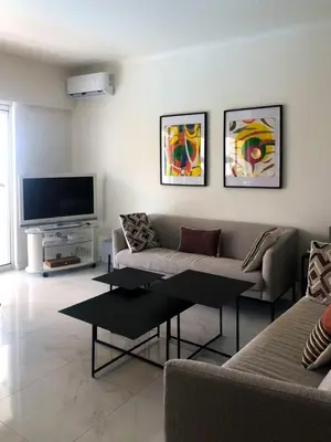 Télévision ou salle de divertissement dans l'établissement Appartement vue mer-piscine-3 pers-Cannes
