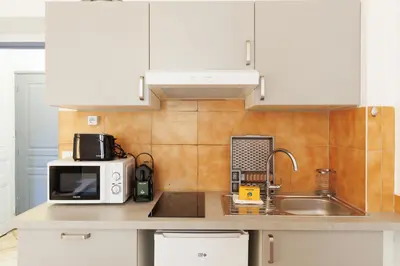 Cuisine ou kitchenette dans l'établissement Mouette YourHostHelper