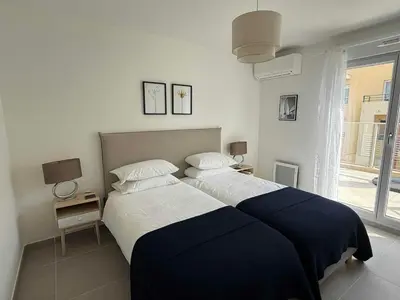 Un ou plusieurs lits dans un hébergement de l'établissement Les Terrasses d'Antibes - 2BR Duplex with Terrace