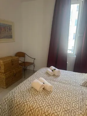Un ou plusieurs lits dans un hébergement de l'établissement Premium central Apartment