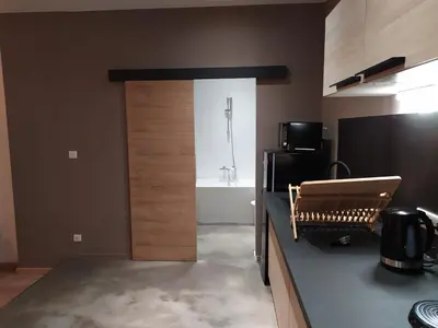 Cuisine ou kitchenette dans l'établissement Le loft