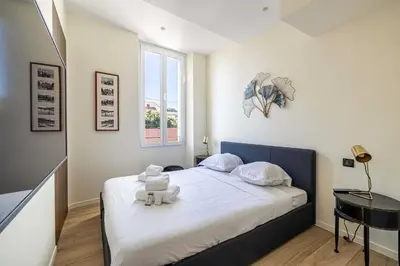 Un ou plusieurs lits dans un hébergement de l'établissement Modern Apartment a c 2CH 4P - Cannes