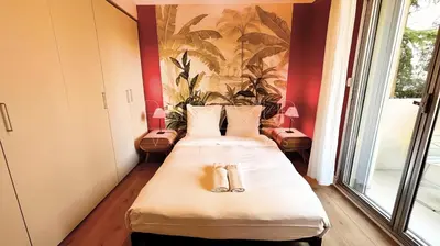 Un ou plusieurs lits dans un hébergement de l'établissement Pointe Croisette, 2 chambres - Exclusivité Congrès - Palmazur Vacances