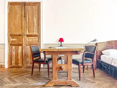 Un ou plusieurs lits dans un hébergement de l'établissement L'olivine - Paisible Loft avec terrasse Cannes