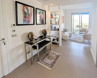 Coin salon dans l'établissement Ref DUNES3 by Palmes d Or Properties