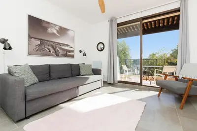 Coin salon dans l'établissement Domaine Cozy Studio Pools, Tennis, Parking