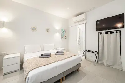 Un ou plusieurs lits dans un hébergement de l'établissement 27 VAUTRIN - Modern and renovated studio Cannes city centre