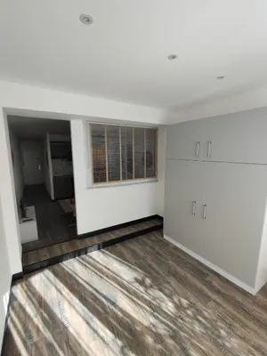 Un ou plusieurs lits dans un hébergement de l'établissement Confortable appartement proche bord de mer