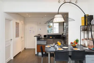 Cuisine ou kitchenette dans l'établissement Le Grain d'Or YourHostHelper