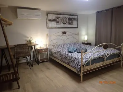 Un ou plusieurs lits dans un hébergement de l'établissement Chambre Privée avec Sauna